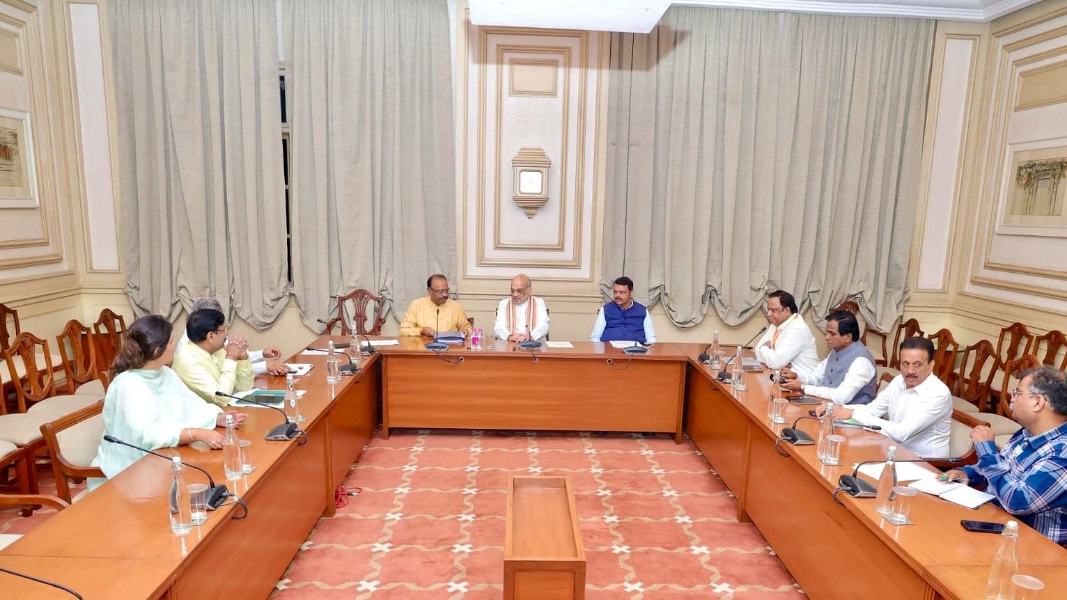 <div class="paragraphs"><p>Union Home Minister Amit Shah chairing a meeting of BJP leaders around midnight in Mumbai</p></div>